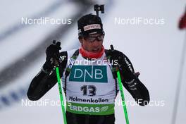04.02.2012, Holmenkollen, Norway (NOR):  Simon Hallenbarter (SUI), Rossignol, Rottefella, KV+, ODLO, Alpina - IBU world cup biathlon, pursuit men, Holmenkollen (NOR). www.nordicfocus.com. Â© Laiho/NordicFocus. Every downloaded picture is fee-liable.