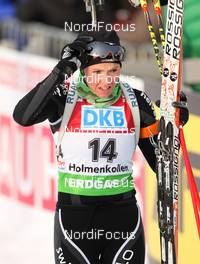 04.02.2012, Holmenkollen, Norway (NOR): Selina Gasparin (SUI), Rossignol, Rottefella, Alpina, Leki, ODLO  - IBU world cup biathlon, pursuit women, Holmenkollen (NOR). www.nordicfocus.com. Â© Laiho/NordicFocus. Every downloaded picture is fee-liable.