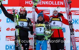 02.02.2012, Holmenkollen, Norway (NOR):  (l-r) Arnd Peiffer (GER), Fischer, Salomon, OneWay, adidas, Evgeniy Garanichev (RUS), Madshus, Rottefella, Swix, adidas and Emil Hegle Svendsen (NOR), Madshus, Rottefella, Swix, Odlo - IBU world cup biathlon, sprint men, Holmenkollen (NOR). www.nordicfocus.com. Â© Laiho/NordicFocus. Every downloaded picture is fee-liable.