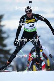 02.02.2012, Holmenkollen, Norway (NOR): Simon Hallenbarter (SUI), Rossignol, Rottefella, KV+, ODLO, Alpina  - IBU world cup biathlon, sprint men, Holmenkollen (NOR). www.nordicfocus.com. Â© Laiho/NordicFocus. Every downloaded picture is fee-liable.