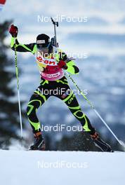 02.02.2012, Holmenkollen, Norway (NOR): Martin Fourcade (FRA), Rossignol, Rottefella, OneWay, Odlo, Julb - IBU world cup biathlon, sprint men, Holmenkollen (NOR). www.nordicfocus.com. Â© Laiho/NordicFocus. Every downloaded picture is fee-liable.