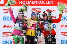 02.02.2012, Holmenkollen, Norway (NOR):  (l-r) Darya Domracheva (BLR), Fischer, Rottefella, Leki, Magdalena Neuner (GER), Fischer, Rottefella, Swix, adidas, Toko and Tora Berger (NOR), Fischer, Rottefella, Odlo - IBU world cup biathlon, sprint women, Holmenkollen (NOR). www.nordicfocus.com. Â© Laiho/NordicFocus. Every downloaded picture is fee-liable.