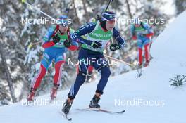 12.02.2012, Kontiolahti, Finland (FIN): Robin Clegg (CAN), Rossignol, Rottefella, Leki, Dmitry Malyshko (RUS), Fischer, Rottefella, Alpina, Leki, adidas - IBU world cup biathlon, pursuit men, Kontiolahti (FIN). www.nordicfocus.com. © Manzoni/NordicFocus. Every downloaded picture is fee-liable.