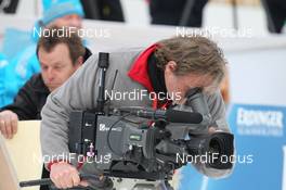 06.03.2012, Ruhpolding, Germany (GER): Event Feature: Camera man at the shooting range - IBU world championships biathlon, individual men, Ruhpolding (GER). www.nordicfocus.com. © Manzoni/NordicFocus. Every downloaded picture is fee-liable.