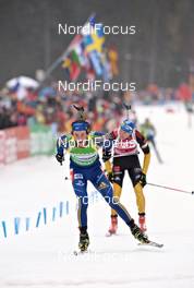 11.03.2012, Ruhpolding, Germany (GER): l-r: Fredrik Lindstroem (SWE), Fischer, Rottefella, Swix, adidas, Andreas Birnbacher (GER), Fischer, Rottefella, Alpina, Leki, adidas - IBU world championships biathlon, mass men, Ruhpolding (GER). www.nordicfocus.com. © Felgenhauer/NordicFocus. Every downloaded picture is fee-liable.