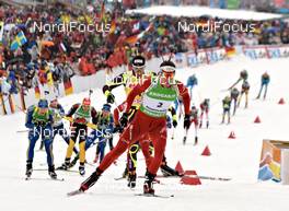 11.03.2012, Ruhpolding, Germany (GER): Emil Hegle Svendsen (NOR), Madshus, Rottefella, Swix, Odlo, Martin Fourcade (FRA), Rossignol, Rottefella, OneWay - IBU world championships biathlon, mass men, Ruhpolding (GER). www.nordicfocus.com. © Felgenhauer/NordicFocus. Every downloaded picture is fee-liable.