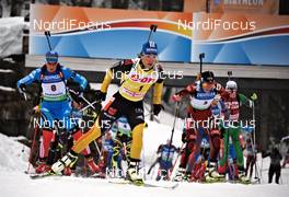 11.03.2012, Ruhpolding, Germany (GER): l-r: Olga Zaitseva (RUS), Madshus, Rottefella, Alpina, adidas, Magdalena Neuner (GER), Fischer, Rottefella, Swix, adidas, Toko, Tora Berger (NOR), Fischer, Rottefella, Odlo - IBU world championships biathlon, mass women, Ruhpolding (GER). www.nordicfocus.com. © Felgenhauer/NordicFocus. Every downloaded picture is fee-liable.