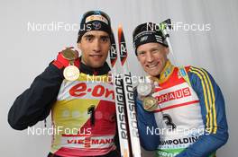 04.03.2012, Ruhpolding, Germany (GER): L-R: Martin Fourcade (FRA), Rossignol, Rottefella, OneWay, Carl-Johan Bergman (SWE), Rossignol, Rottefella, Leki, adidas - IBU world championships biathlon, medals, Ruhpolding (GER). www.nordicfocus.com. © Manzoni/NordicFocus. Every downloaded picture is fee-liable.