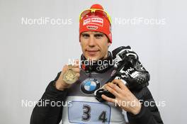 09.03.2012, Ruhpolding, Germany (GER): Arnd Peiffer (GER), Fischer, Salomon, OneWay, adidas - IBU world championships biathlon, medals, Ruhpolding (GER). www.nordicfocus.com. © Manzoni/NordicFocus. Every downloaded picture is fee-liable.