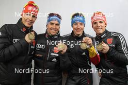 09.03.2012, Ruhpolding, Germany (GER): L-R: Arnd Peiffer (GER), Fischer, Salomon, OneWay, adidas, Michael Greis (GER), Madshus, Rottefella, OneWay, adidas, Andreas Birnbacher (GER), Fischer, Rottefella, Alpina, Leki, adidas, Simon Schempp (GER), Fischer, Rottefella, Alpina, Leki, adidas  - IBU world championships biathlon, medals, Ruhpolding (GER). www.nordicfocus.com. © Manzoni/NordicFocus. Every downloaded picture is fee-liable.