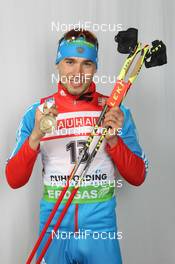 04.03.2012, Ruhpolding, Germany (GER): Anton Shipulin (RUS), Madshus, Rottefella, adidas - IBU world championships biathlon, medals, Ruhpolding (GER). www.nordicfocus.com. © Manzoni/NordicFocus. Every downloaded picture is fee-liable.