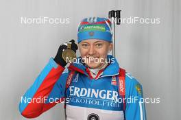 04.03.2012, Ruhpolding, Germany (GER): Olga Vilukhina (RUS), Fischer, Rottefella, Swix, adidas  - IBU world championships biathlon, medals, Ruhpolding (GER). www.nordicfocus.com. © Manzoni/NordicFocus. Every downloaded picture is fee-liable.