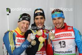 04.03.2012, Ruhpolding, Germany (GER): L-R: Carl-Johan Bergman (SWE), Rossignol, Rottefella, Leki, adidas, Martin Fourcade (FRA), Rossignol, Rottefella, OneWay, Anton Shipulin (RUS), Madshus, Rottefella, adidas - IBU world championships biathlon, medals, Ruhpolding (GER). www.nordicfocus.com. © Manzoni/NordicFocus. Every downloaded picture is fee-liable.