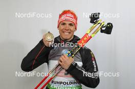 09.03.2012, Ruhpolding, Germany (GER): Simon Schempp (GER), Fischer, Rottefella, Alpina, Leki, adidas  - IBU world championships biathlon, medals, Ruhpolding (GER). www.nordicfocus.com. © Manzoni/NordicFocus. Every downloaded picture is fee-liable.