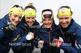10.03.2012, Ruhpolding, Germany (GER): L-R: Marie Laure Brunet (FRA), Rossignol, Rottefella, Swix, Marie Dorin (FRA), Rossignol, Rottefella, OneWay, Sofie Boilley (FRA), Rossignol, Rottefella, OneWay, Anais Bescond (FRA), Madshus, Rottefella, Swix, OneWay - IBU world championships biathlon, medals, Ruhpolding (GER). www.nordicfocus.com. © Manzoni/NordicFocus. Every downloaded picture is fee-liable.