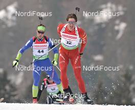 04.03.2012, Ruhpolding, Germany (GER): l-r: Klemen Bauer (SLO), Fischer, Rottefella, Alpina, Swix, Lars Berger (NOR), Madshus, Salomon, Swix, Odlo - IBU world championships biathlon, pursuit men, Ruhpolding (GER). www.nordicfocus.com. © Felgenhauer/NordicFocus. Every downloaded picture is fee-liable.
