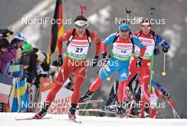 04.03.2012, Ruhpolding, Germany (GER): l-r: Ole Einar Bjoerndalen (NOR), Madshus, Rottefella, Odlo, Evgeniy Garanichev (RUS), Madshus, Rottefella, Swix, adidas - IBU world championships biathlon, pursuit men, Ruhpolding (GER). www.nordicfocus.com. © Felgenhauer/NordicFocus. Every downloaded picture is fee-liable.
