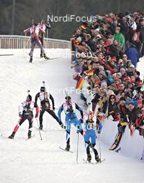 04.03.2012, Ruhpolding, Germany (GER): athletes passin spectators - IBU world championships biathlon, pursuit men, Ruhpolding (GER). www.nordicfocus.com. © Felgenhauer/NordicFocus. Every downloaded picture is fee-liable.