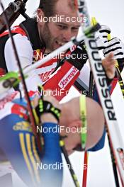 04.03.2012, Ruhpolding, Germany (GER): l-r: Daniel Mesotitsch (AUT), Fischer, Rottefella, Leki, Carl-Johan Bergman (SWE), Rossignol, Rottefella, Leki, adidas - IBU world championships biathlon, pursuit men, Ruhpolding (GER). www.nordicfocus.com. © Felgenhauer/NordicFocus. Every downloaded picture is fee-liable.