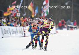 04.03.2012, Ruhpolding, Germany (GER): l-r: Carl-Johan Bergman (SWE), Rossignol, Rottefella, Leki, adidas, Daniel Mesotitsch (AUT), Fischer, Rottefella, Leki, Martin Fourcade (FRA), Rossignol, Rottefella, OneWay - IBU world championships biathlon, pursuit men, Ruhpolding (GER). www.nordicfocus.com. © Felgenhauer/NordicFocus. Every downloaded picture is fee-liable.