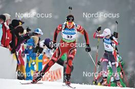 04.03.2012, Ruhpolding, Germany (GER): l-r: Synnoeve Solemdal (NOR), Madshus, Rottefella, Swix, ODLO, Agnieszka Cyl (POL), Fischer, Rottefella, Alpina, Leki, Casco - IBU world championships biathlon, pursuit women, Ruhpolding (GER). www.nordicfocus.com. © Felgenhauer/NordicFocus. Every downloaded picture is fee-liable.
