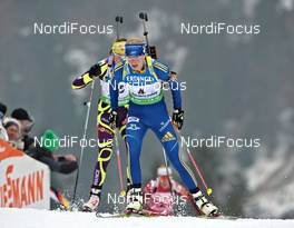 04.03.2012, Ruhpolding, Germany (GER): l-r: Marie Laure Brunet (FRA), Rossignol, Rottefella, Swix, Helena Ekholm (SWE), Fischer, Rottefella, Leki, adidas - IBU world championships biathlon, pursuit women, Ruhpolding (GER). www.nordicfocus.com. © Felgenhauer/NordicFocus. Every downloaded picture is fee-liable.