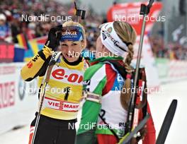 04.03.2012, Ruhpolding, Germany (GER): l-r: Magdalena Neuner (GER), Fischer, Rottefella, Swix, adidas, Toko, Darya Domracheva (BLR), Fischer, Rottefella, Leki - IBU world championships biathlon, pursuit women, Ruhpolding (GER). www.nordicfocus.com. © Felgenhauer/NordicFocus. Every downloaded picture is fee-liable.