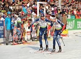 09.03.2012, Ruhpolding, Germany (GER): l-r: Jay Hakkinen (USA), Rossignol, Rottefella, Swix, adidas, Tim Burke (USA), Rossignol, Rottefella, OneWay, adidas - IBU world championships biathlon, relay men, Ruhpolding (GER). www.nordicfocus.com. © Felgenhauer/NordicFocus. Every downloaded picture is fee-liable.