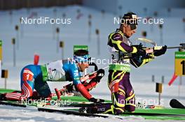 09.03.2012, Ruhpolding, Germany (GER): l-r: Evgeniy Garanichev (RUS), Madshus, Rottefella, Swix, adidas, Alexis Boeuf (FRA), Salomon, Swix, OneWay - IBU world championships biathlon, relay men, Ruhpolding (GER). www.nordicfocus.com. © Felgenhauer/NordicFocus. Every downloaded picture is fee-liable.