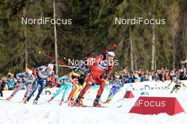 09.03.2012, Ruhpolding, Germany (GER): Ole Einar Bjoerndalen (NOR), Madshus, Rottefella, Odlo Simon Schempp (GER), Fischer, Rottefella, Alpina, Leki, adidas  - IBU world championships biathlon, relay men, Ruhpolding (GER). www.nordicfocus.com. © Manzoni/NordicFocus. Every downloaded picture is fee-liable.