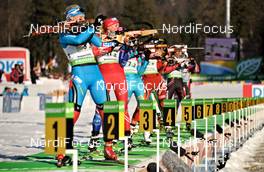 10.03.2012, Ruhpolding, Germany (GER): l-r: Olga Zaitseva (RUS), Madshus, Rottefella, Alpina, adidas, Barbora Tomesova (CZE), Salomon, OneWay, Valj Semerenko (UKR), Fischer, Salomon, Swix, Elise Ringen (NOR), Fischer, Rottefella, Odlo - IBU world championships biathlon, relay women, Ruhpolding (GER). www.nordicfocus.com. © Felgenhauer/NordicFocus. Every downloaded picture is fee-liable.