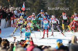 10.03.2012, Ruhpolding, Germany (GER): Natalya Burdyga (URK), Fischer, Rottefella, Swix leads the field - IBU world championships biathlon, relay women, Ruhpolding (GER). www.nordicfocus.com. © Manzoni/NordicFocus. Every downloaded picture is fee-liable.