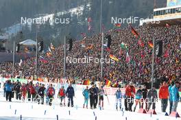 10.03.2012, Ruhpolding, Germany (GER): Event Feature: Athletes walk to the start - IBU world championships biathlon, relay women, Ruhpolding (GER). www.nordicfocus.com. © Manzoni/NordicFocus. Every downloaded picture is fee-liable.