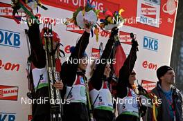 10.03.2012, Ruhpolding, Germany (GER): l-r: Tina Bachmann (GER), Fischer, Rottefella, Swix, adidas, Magdalena Neuner (GER), Fischer, Rottefella, Swix, adidas, Toko, Miriam Goessner (GER), Fischer, Salomon, Swix, adidas, Andrea Henkel (GER), Fischer, Rottefella, Swix, adidas, Toko - IBU world championships biathlon, relay women, Ruhpolding (GER). www.nordicfocus.com. © Felgenhauer/NordicFocus. Every downloaded picture is fee-liable.