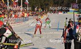 10.03.2012, Ruhpolding, Germany (GER): Tora Berger (NOR), Fischer, Rottefella, Odlo, arrives at the finish - IBU world championships biathlon, relay women, Ruhpolding (GER). www.nordicfocus.com. © Felgenhauer/NordicFocus. Every downloaded picture is fee-liable.