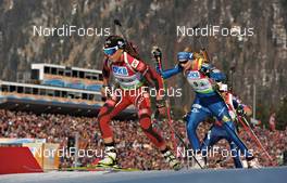 10.03.2012, Ruhpolding, Germany (GER): l-r: Elise Ringen (NOR), Anna Maria Nilsson (SWE), Fischer, Odlo, Leki, Madshus, adidas - IBU world championships biathlon, relay women, Ruhpolding (GER). www.nordicfocus.com. © Felgenhauer/NordicFocus. Every downloaded picture is fee-liable.