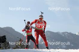 03.03.2012, Ruhpolding, Germany (GER): Emil Hegle Svendsen (NOR), Madshus, Rottefella, Swix, Odlo, Daniel Mesotitsch (AUT), Fischer, Rottefella, Leki - IBU world championships biathlon, sprint men, Ruhpolding (GER). www.nordicfocus.com. © Manzoni/NordicFocus. Every downloaded picture is fee-liable.