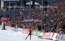 03.03.2012, Ruhpolding, Germany (GER): Jean Philippe Leguellec (CAN), Rossignol, Rottefella, Swix, arrives at the finish - IBU world championships biathlon, sprint men, Ruhpolding (GER). www.nordicfocus.com. © Felgenhauer/NordicFocus. Every downloaded picture is fee-liable.