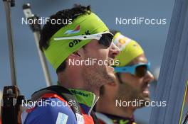 03.03.2012, Ruhpolding, Germany (GER): Jakov Fak (SLO), Fischer, Rottefella, Alpina, Swix, Simon Fourcade (FRA), Fischer, Rottefella, Rossignol, Swix, Odlo - IBU world championships biathlon, sprint men, Ruhpolding (GER). www.nordicfocus.com. © Manzoni/NordicFocus. Every downloaded picture is fee-liable.
