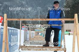 28.02.2012, Ruhpolding, Germany (GER): Event Feature: a track marshall waits for action - IBU world championships biathlon, training, Ruhpolding (GER). www.nordicfocus.com. © Manzoni/NordicFocus. Every downloaded picture is fee-liable.