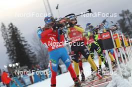 02.12.2012, Oestersund, Sweden (SWE): Evgeny Ustyugov (RUS), Fischer, Rottefella, Swix, adidas, Andreas Birnbacher (GER), Fischer, Rottefella, Alpina, Leki, adidas, Martin Fourcade (FRA), Rossignol, Rottefella, OneWay - IBU world cup biathlon, pursuit men, Oestersund (SWE). www.nordicfocus.com. © Manzoni/NordicFocus. Every downloaded picture is fee-liable.