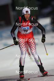 02.12.2012, Oestersund, Sweden (SWE): Zina Kocher (CAN), Atomic, Leki, Odlo - IBU world cup biathlon, pursuit women, Oestersund (SWE). www.nordicfocus.com. © Manzoni/NordicFocus. Every downloaded picture is fee-liable.