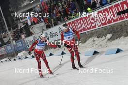 25.11.2012, Oestersund, Sweden (SWE): Erlend Bjoentegaard (NOR), Madshus, Rottefella, Swix, Emil Hegle Svendsen (NOR), Madshus, Rottefella, Swix, Odlo - IBU world cup biathlon, relay mixed, Oestersund (SWE). www.nordicfocus.com. © Manzoni/NordicFocus. Every downloaded picture is fee-liable.