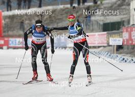 25.11.2012, Oestersund, Sweden (SWE): Benjamin Weger (SUI), Atomic, Alpina, Swix, Casco, Toko, ODLO, Selina Gasparin (SUI), Rossignol, Rottefella, Alpina, Swix, ODLO, CASCO - IBU world cup biathlon, relay mixed, Oestersund (SWE). www.nordicfocus.com. © Manzoni/NordicFocus. Every downloaded picture is fee-liable.