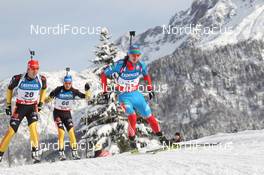 07.12.2012, Hochfilzen, Austria (AUT): Evgeny Ustyugov (RUS), Fischer, Rottefella, Swix, adidas, Arnd Peiffer (GER), Fischer, Salomon, OneWay, adidas, Eric Lesser (GER), Salomon, Swix, adidas - IBU world cup biathlon, sprint men, Hochfilzen (AUT). www.nordicfocus.com. © Manzoni/NordicFocus. Every downloaded picture is fee-liable.