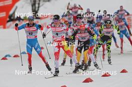 01.01.2012, Oberstdorf, Germany (GER): group, in front Devon Kershaw (CAN), Fischer, Salomon, Swix, One Way, behind Tobias Angerer (GER), Rossignol, Rottefella, One Way, adidas  - FIS world cup cross-country, tour de ski, skiathlon men, Oberstdorf (GER). www.nordicfocus.com. © Hemmersbach/NordicFocus. Every downloaded picture is fee-liable.