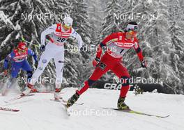 04.01.2012, Cortina-Toblach, Italy (ITA): group, in front Marit Bjoergen (NOR), Fischer, Rottefella, Swix, behind Ida Ingemarsdotter (SWE), Rossignol, Rottefella, Craft  - FIS world cup cross-country, tour de ski, individual sprint, Cortina-Toblach (ITA). www.nordicfocus.com. © Hemmersbach/NordicFocus. Every downloaded picture is fee-liable.