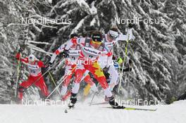 04.01.2012, Cortina-Toblach, Italy (ITA): in front Devon Kershaw (CAN), Fischer, Salomon, Swix, One Way, behind Teodor Peterson (SWE), Rossignol, Alpina, One Way, Craft  - FIS world cup cross-country, tour de ski, individual sprint, Cortina-Toblach (ITA). www.nordicfocus.com. © Hemmersbach/NordicFocus. Every downloaded picture is fee-liable.