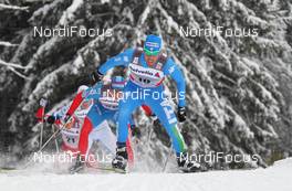 04.01.2012, Cortina-Toblach, Italy (ITA): group, in front Fabio Pasini (ITA), Fischer, Salomon, One Way, behind Alexander Legkov (RUS), Rossignol, Rottefella, Swix, adidas  - FIS world cup cross-country, tour de ski, individual sprint, Cortina-Toblach (ITA). www.nordicfocus.com. © Hemmersbach/NordicFocus. Every downloaded picture is fee-liable.
