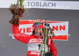 04.01.2012, Cortina-Toblach, Italy (ITA): todays winner Marit Bjoergen (NOR), Fischer, Rottefella, Swix  - FIS world cup cross-country, tour de ski, individual sprint, Cortina-Toblach (ITA). www.nordicfocus.com. © Hemmersbach/NordicFocus. Every downloaded picture is fee-liable.